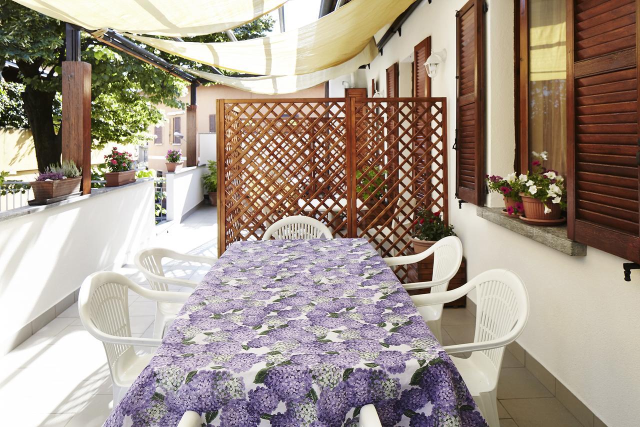 Bed and Breakfast Beb I Portici Черноббио Экстерьер фото