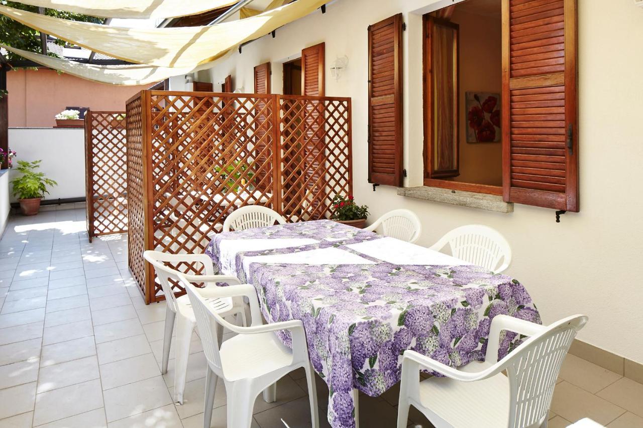 Bed and Breakfast Beb I Portici Черноббио Экстерьер фото