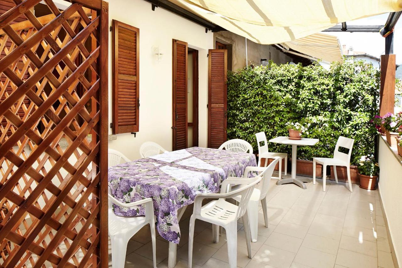 Bed and Breakfast Beb I Portici Черноббио Экстерьер фото